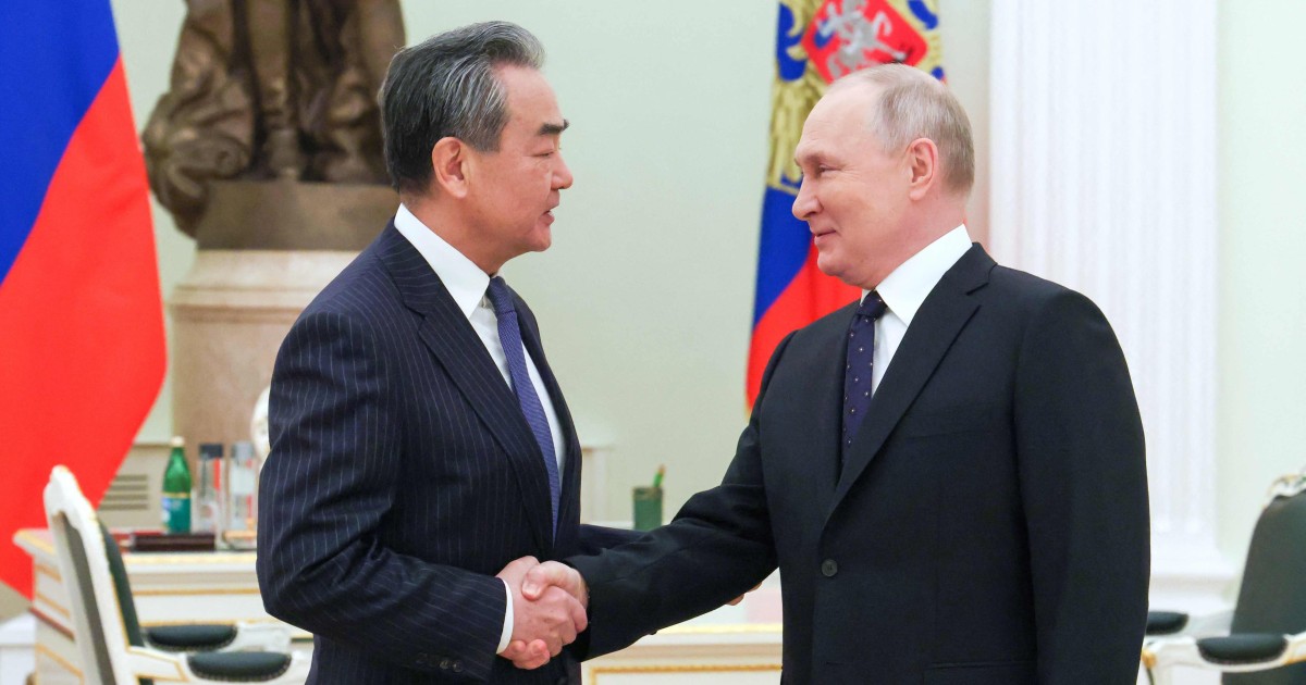 Putin meets top Chinese diplomat as Beijing’s Ukraine balancing act looks to be shifting in Moscow’s favor
