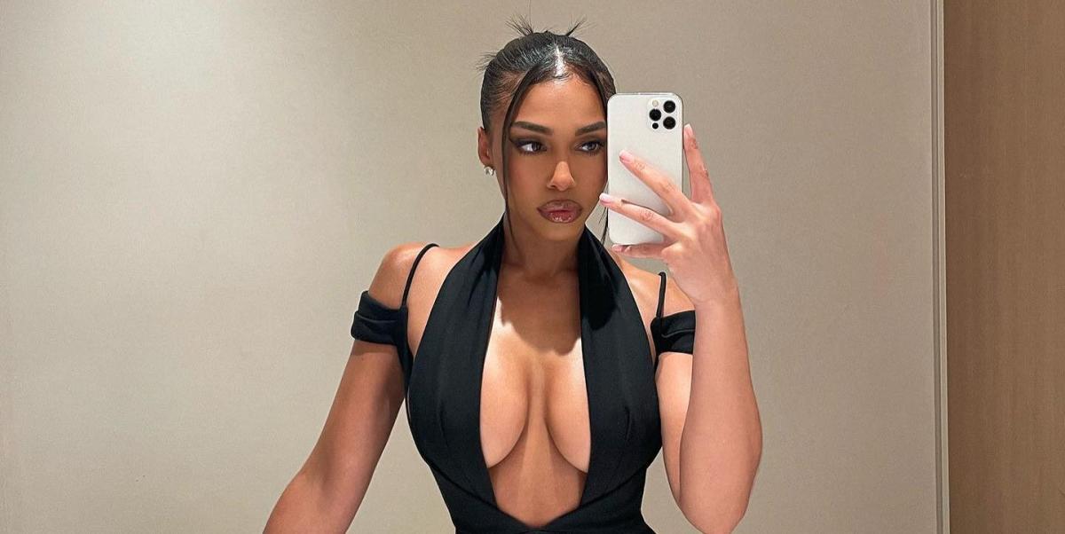 Lori Harvey Serves Major Bond Girl Energy in a Plunging Black Dress with Y2K Hair