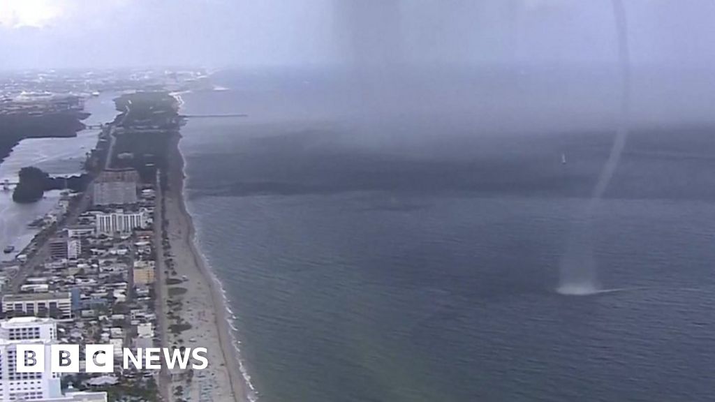 Waterspout crashes onto beach full of people in Miami