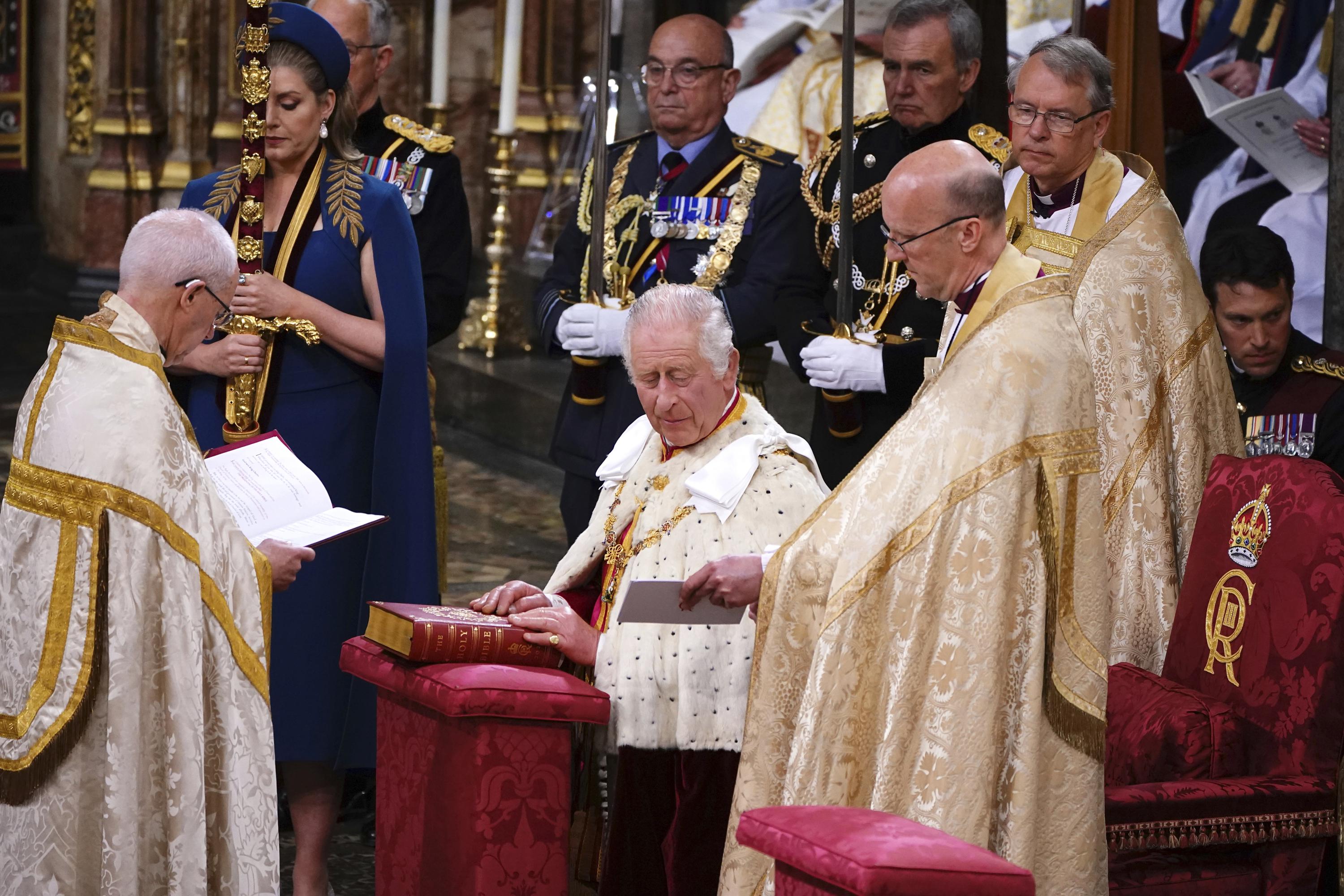 King Charles III crowned in ancient rite at uncertain moment