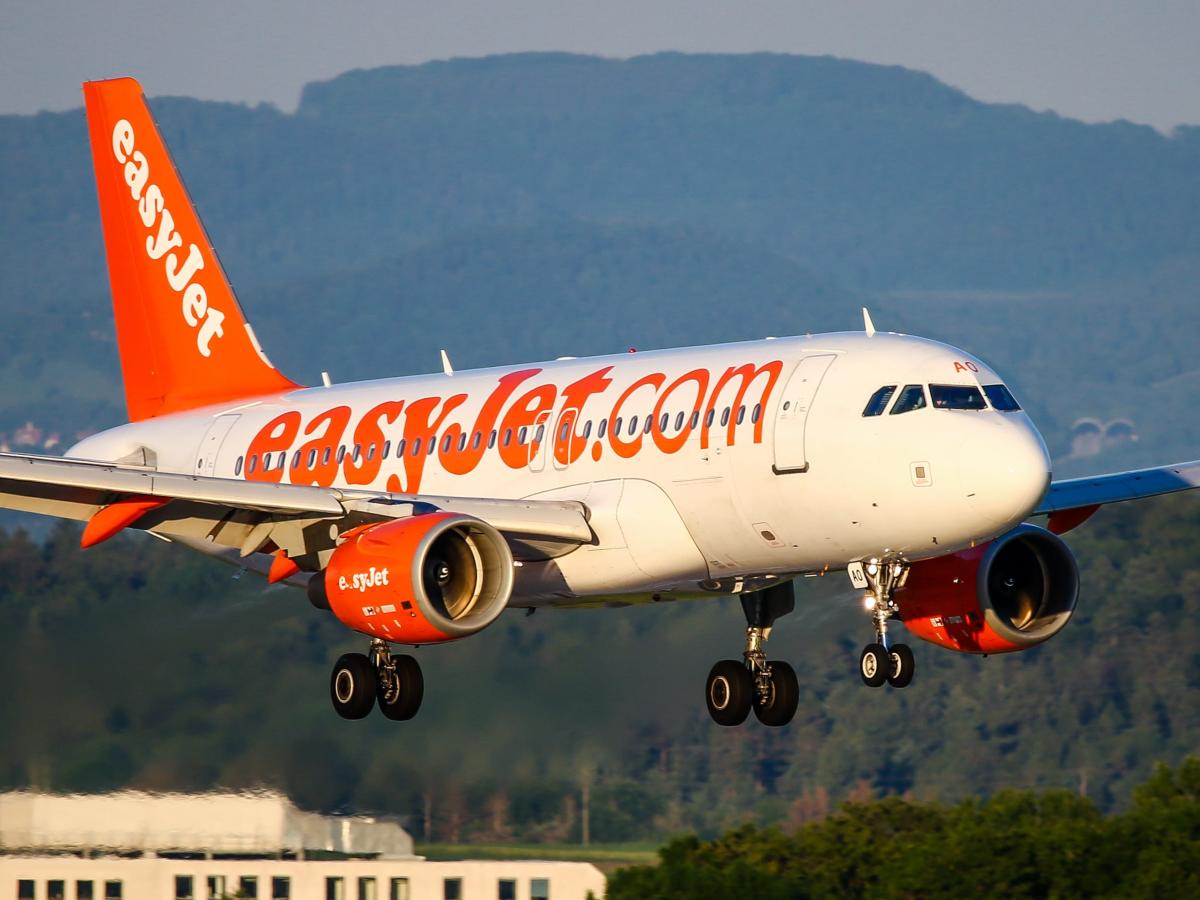 A couple were caught having sex in an EasyJet plane toilet and were met by police when they landed