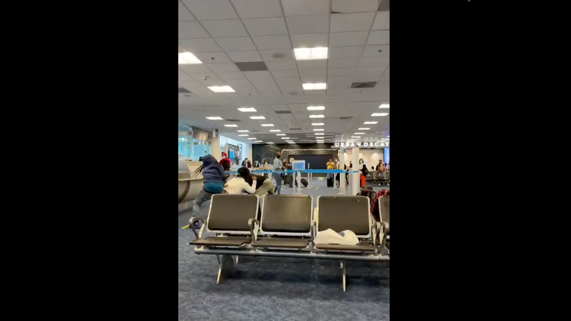 Large fight breaks out at Miami International Airport. One arrest made