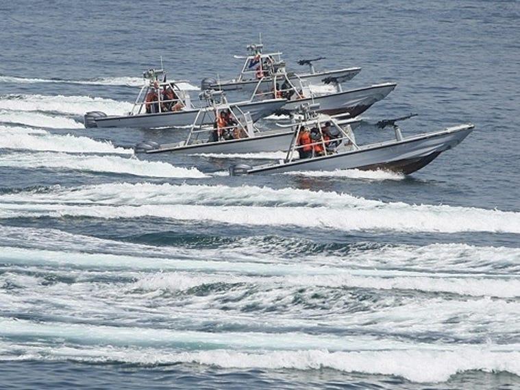 Iranian vessels swarmed and harassed US Coast Guard ships for hours in the Persian Gulf