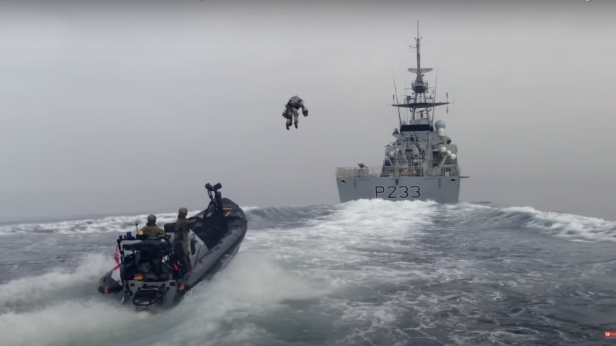Watch A Marine Land on a Speeding Ship Using a Jetpack