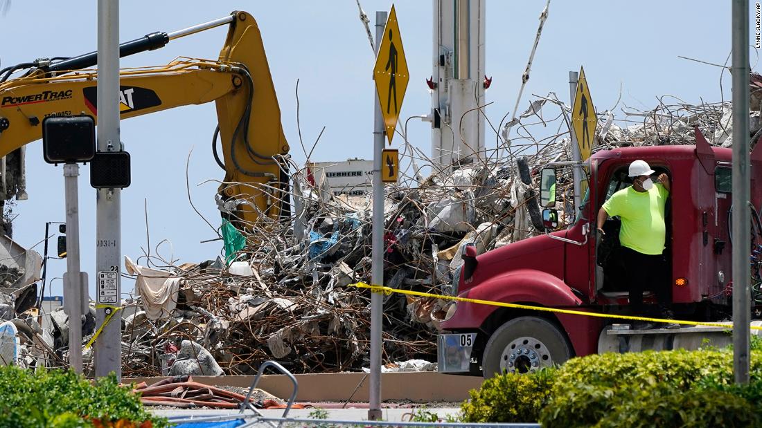The death toll in the Surfside condo collapse has risen to 97