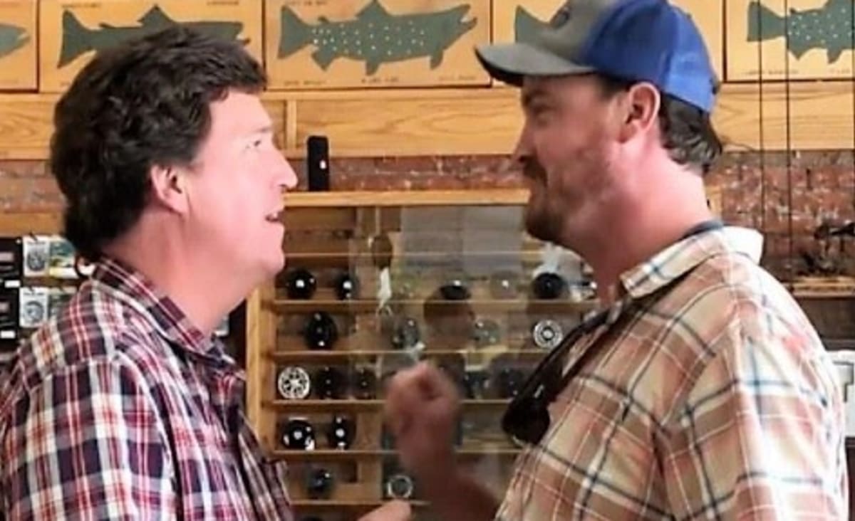 Viral video shows man confront Tucker Carlson in fishing store — but it doesn't go as man hoped: 'Tucker wins again'