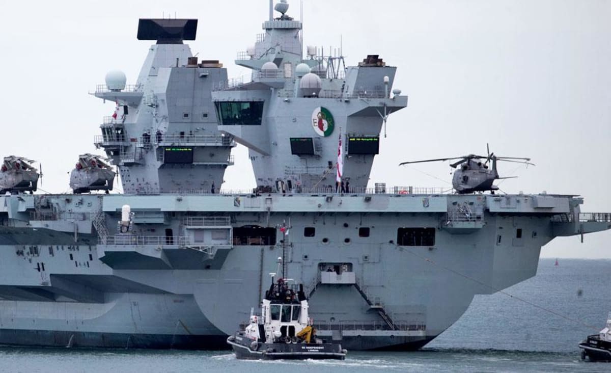 China warns UK as carrier strike group approaches