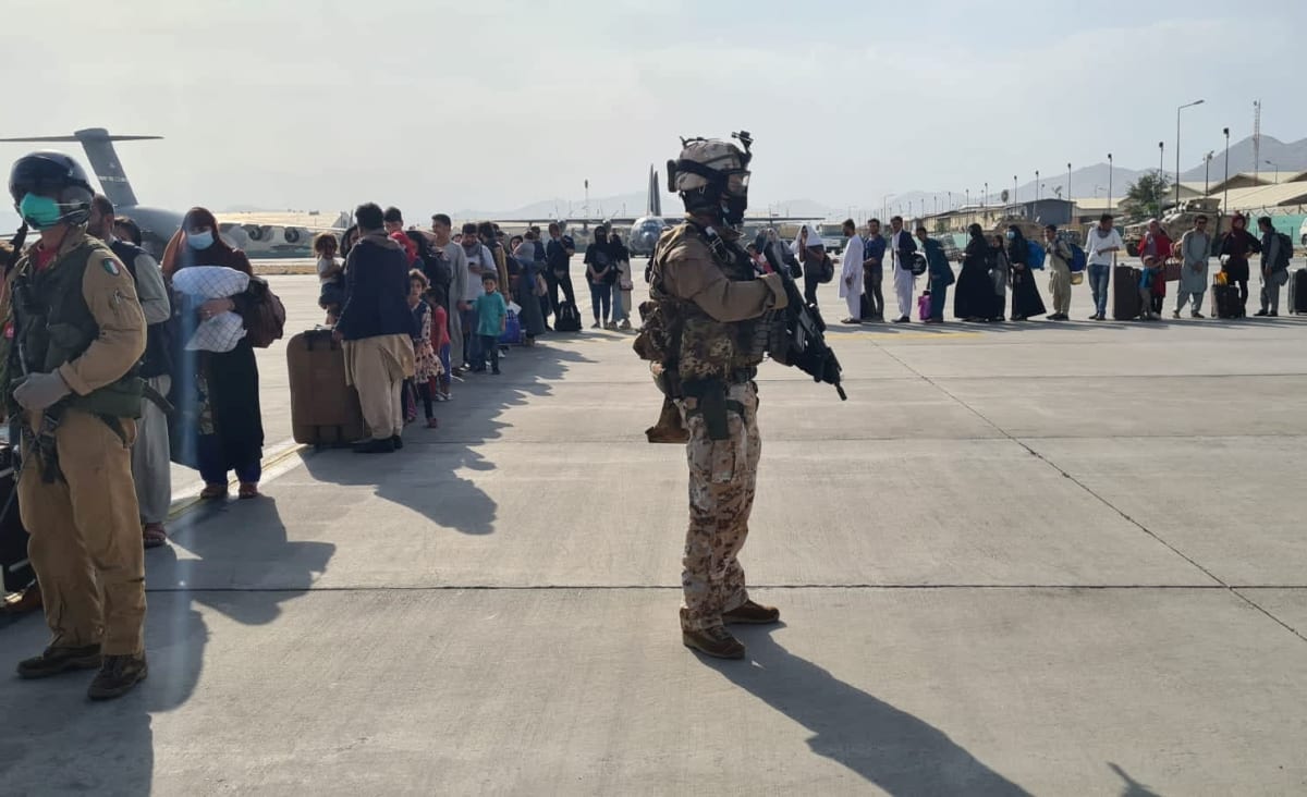 Deadly firefight erupts at Kabul airport as evacuation chaos continues into second week