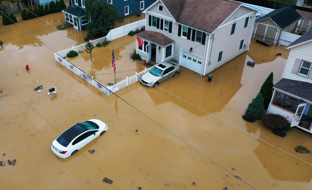 Startling photos capture East Coast flooding and wreckage from Tropical Storm Henri