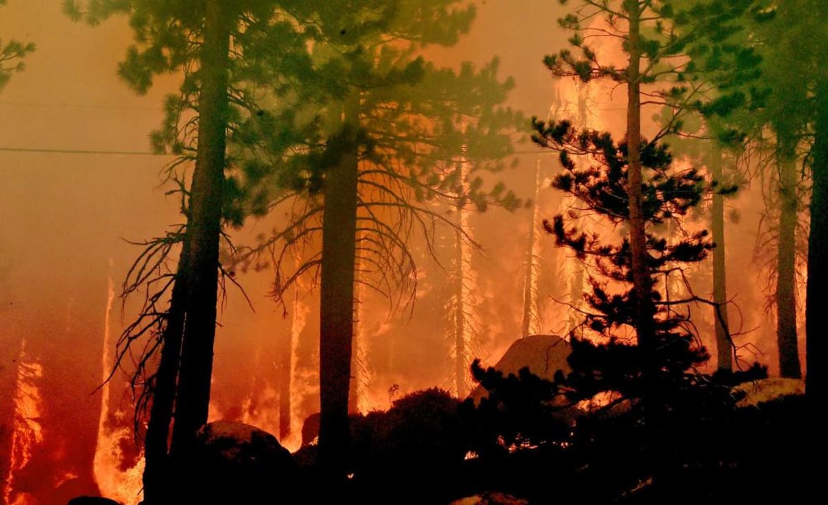 Hospital patients are being evacuated as the rapidly growing Caldor Fire edges closer to California's Lake Tahoe region