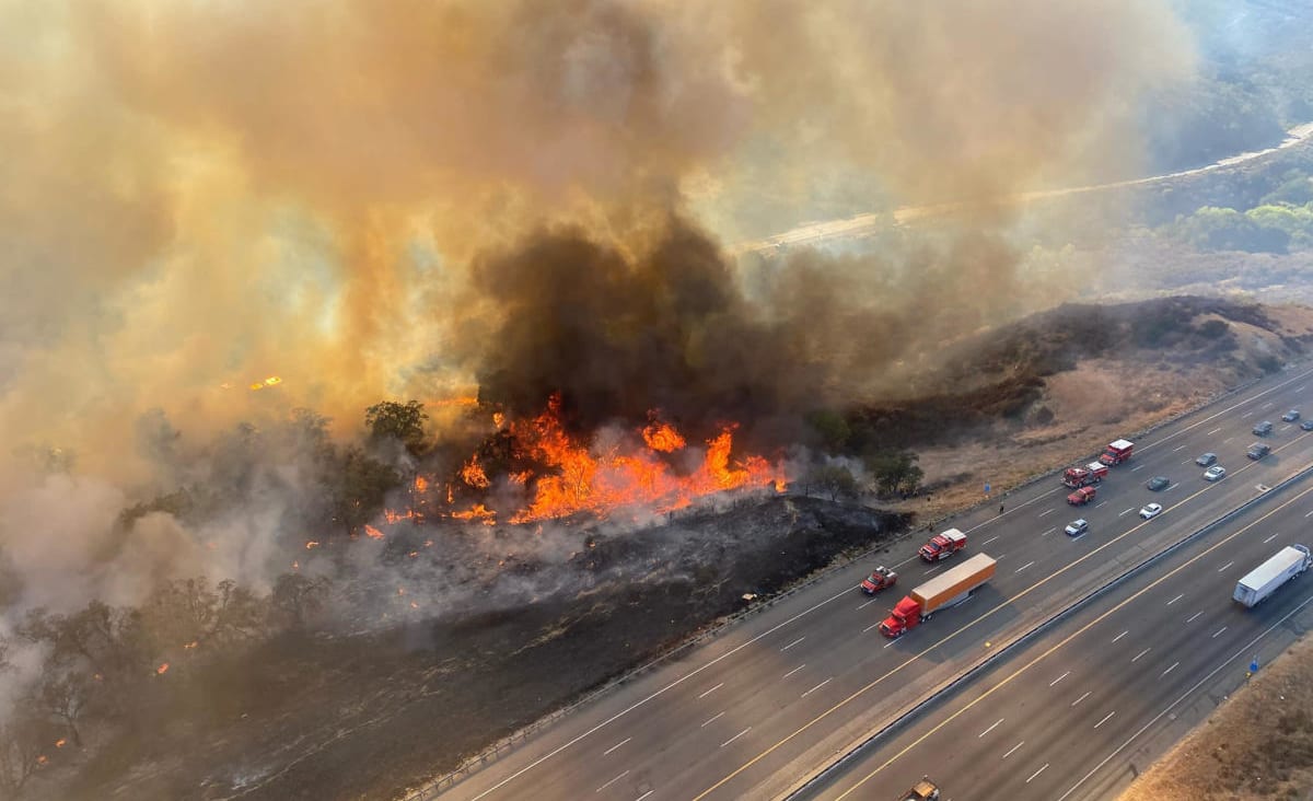 Wildfire forces closure of part of freeway in California
