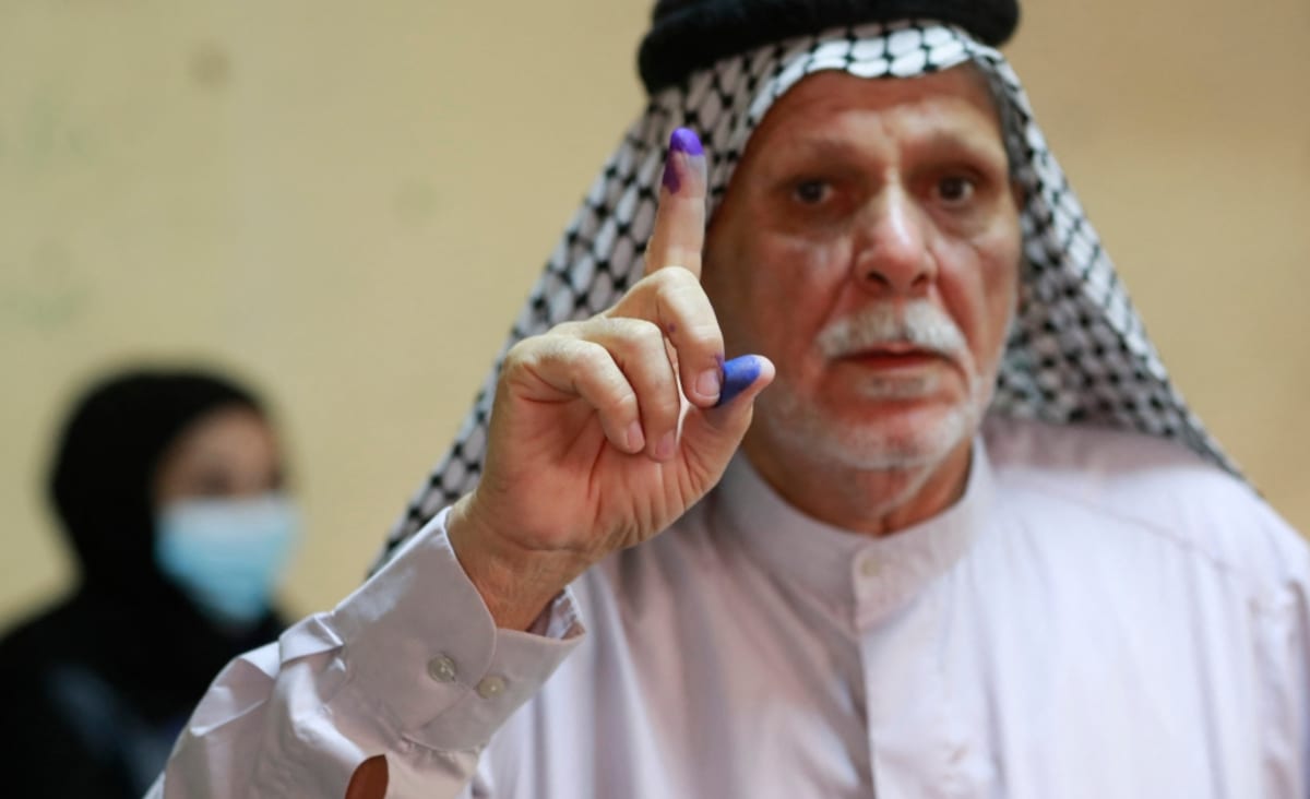 Iraqi voters head to the polls in test for democratic system