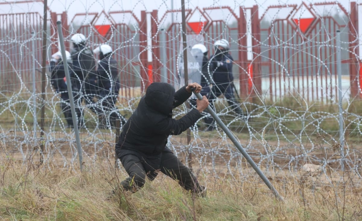 Clashes erupt at Belarus-Poland border as refugee crisis unfolds