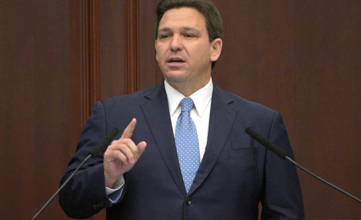 Rating agency gives a 'rating watch negative' as DeSantis signs Disney bill