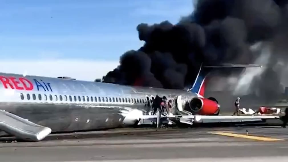 Watch: Passengers Flee Burning Jet at Miami Airport