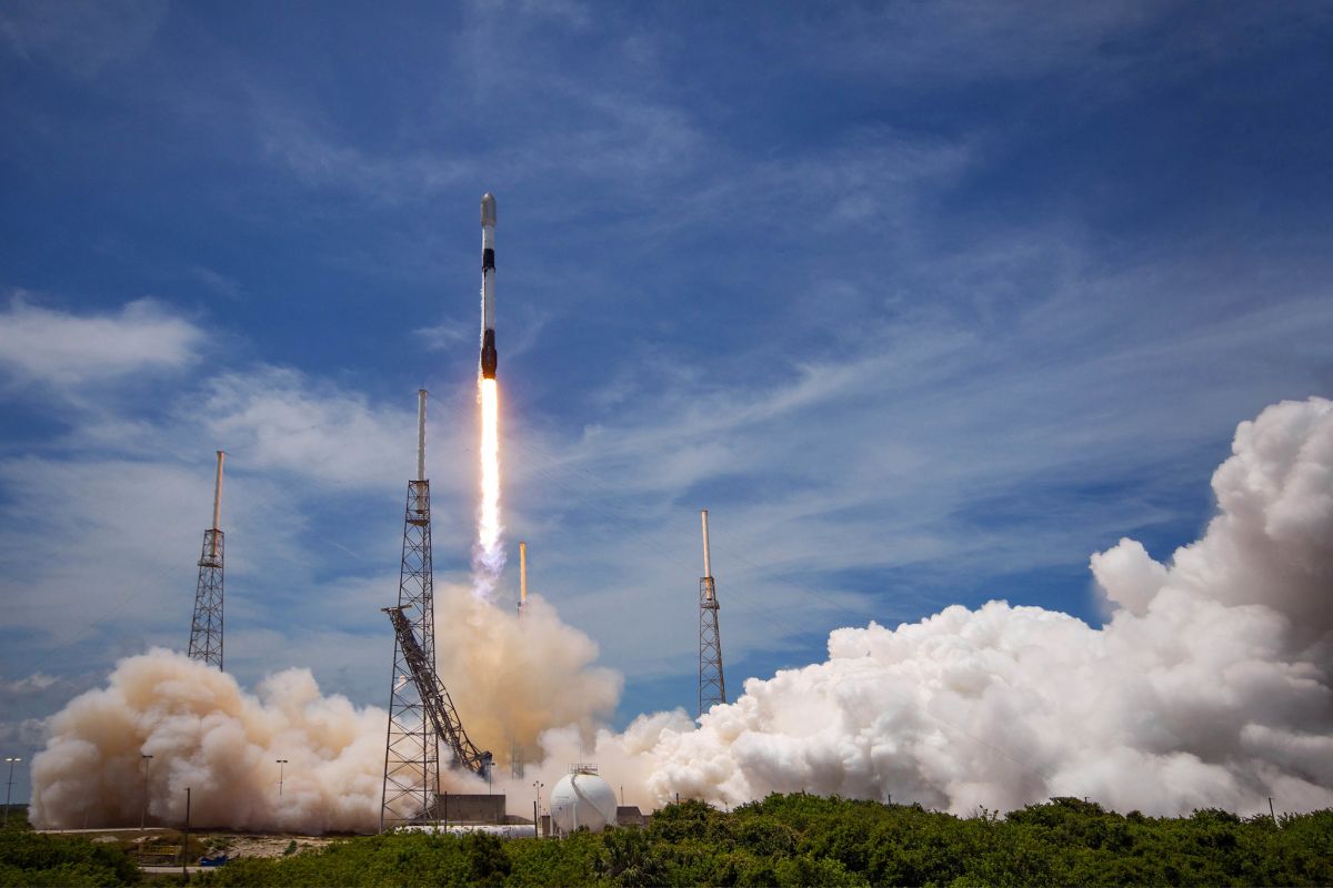 Watch SpaceX launch communications satellite, land rocket at sea Wednesday