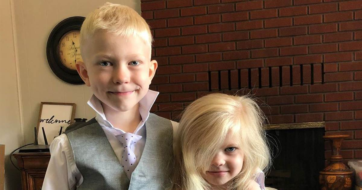 Boy, 6, survives dog attack after stepping in front of sister to save her