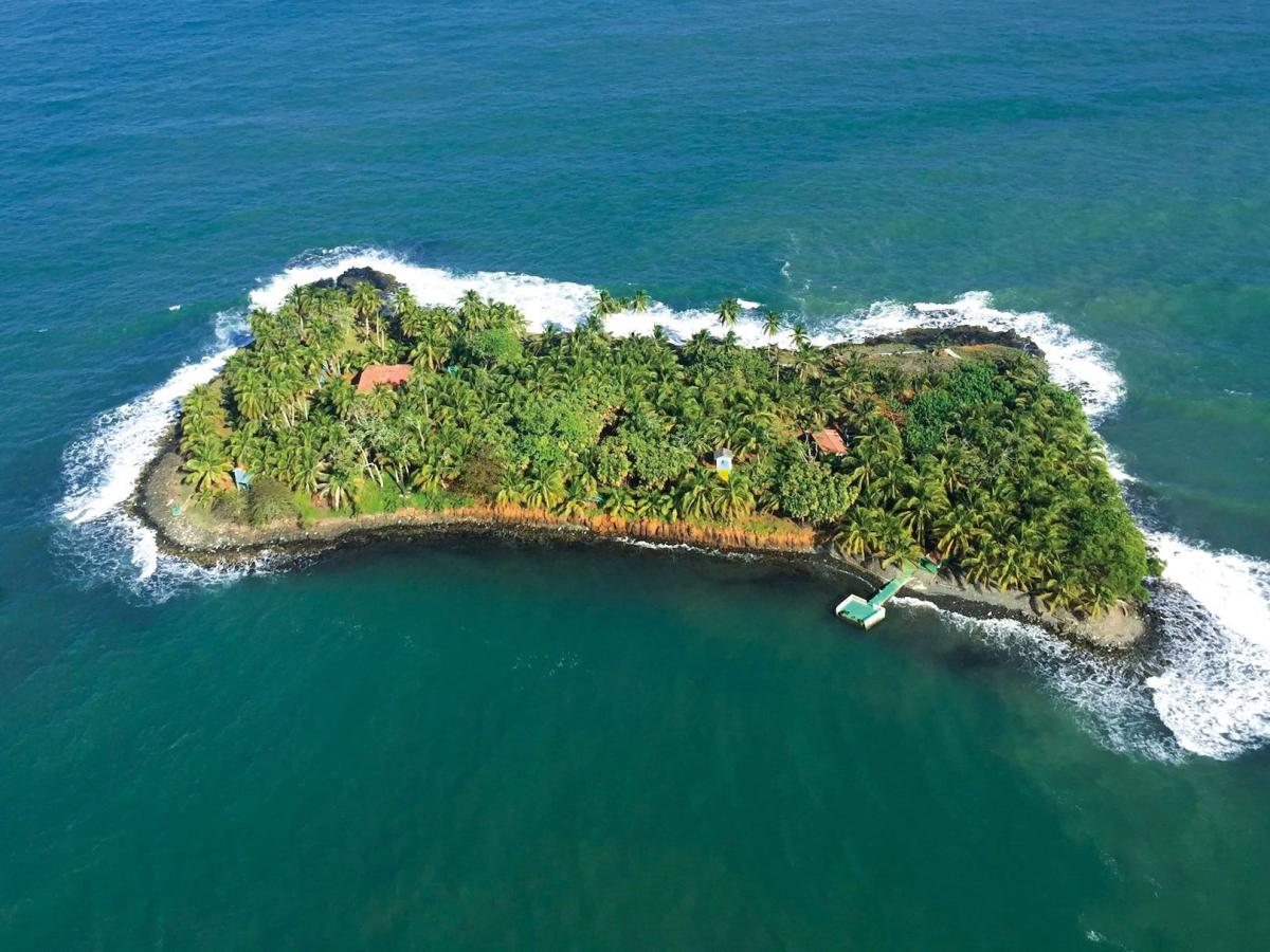 A private island in the Caribbean Sea is on sale for less than the average house in America. Take a look.