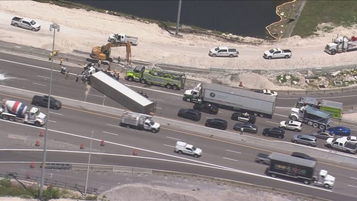 Tractor-trailer rollover shuts down NB lanes of Turnpike in northwest Miami-Dade