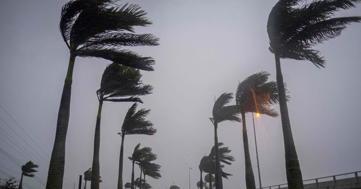 Hurricane Ian downgraded to tropical storm as it continues to batter Florida