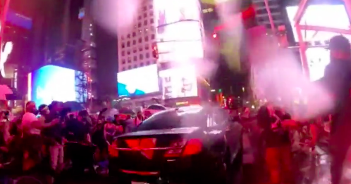 Car accelerates through Black Lives Matter protesters in Times Square, who had gathered to honor Daniel Prude