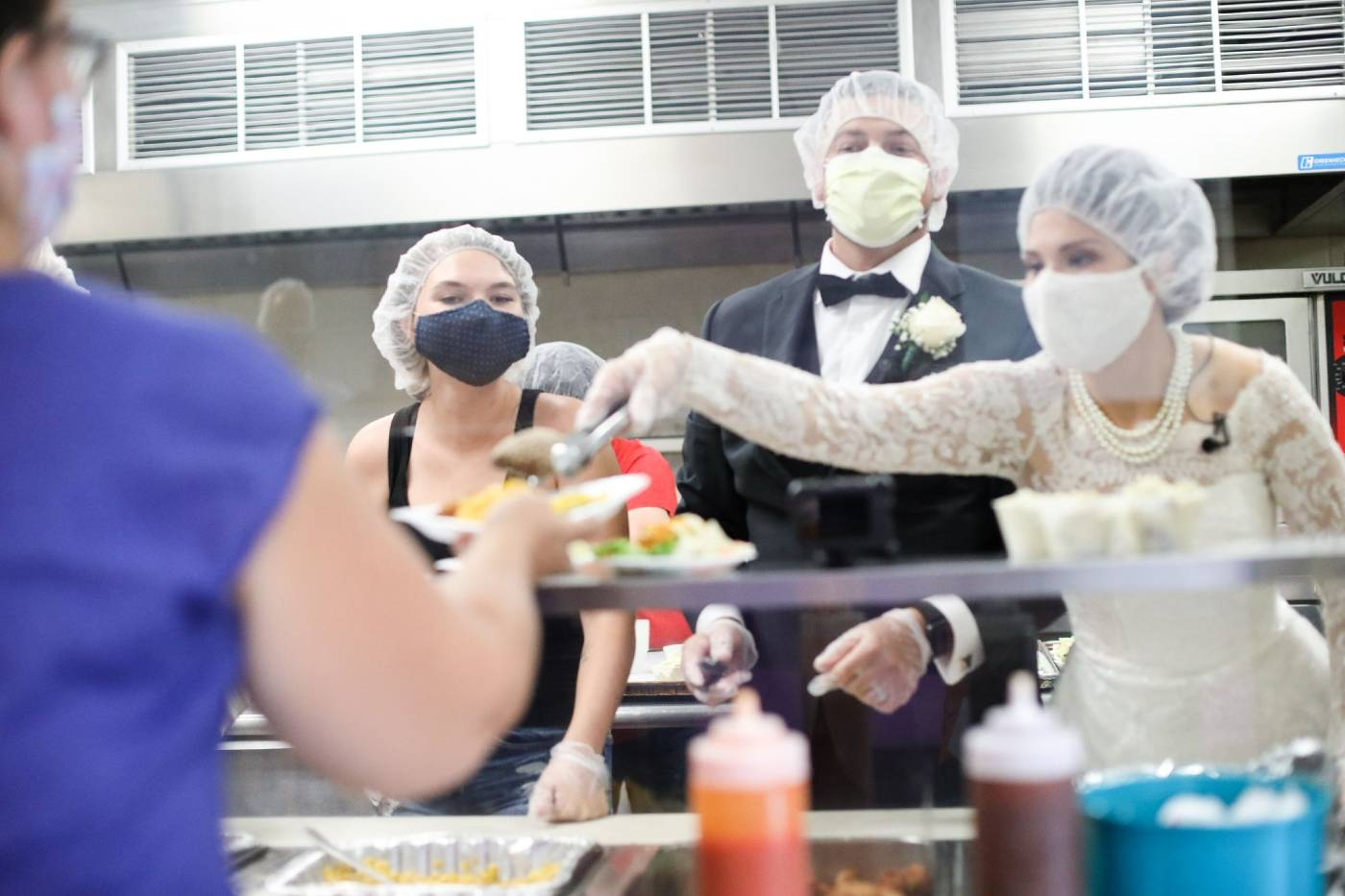 Bride and Groom Didn’t Just Donate Wedding Food To Homeless, They Dished it Up On Their Big Day
