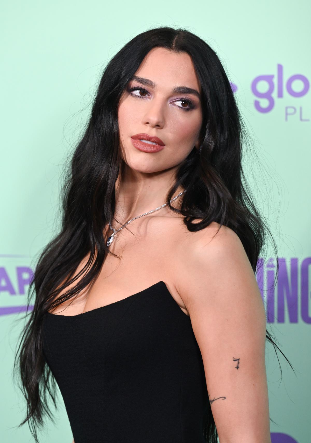 Dua Lipa Embraced the Exposed Thong Dress Trend on New Year's Eve
