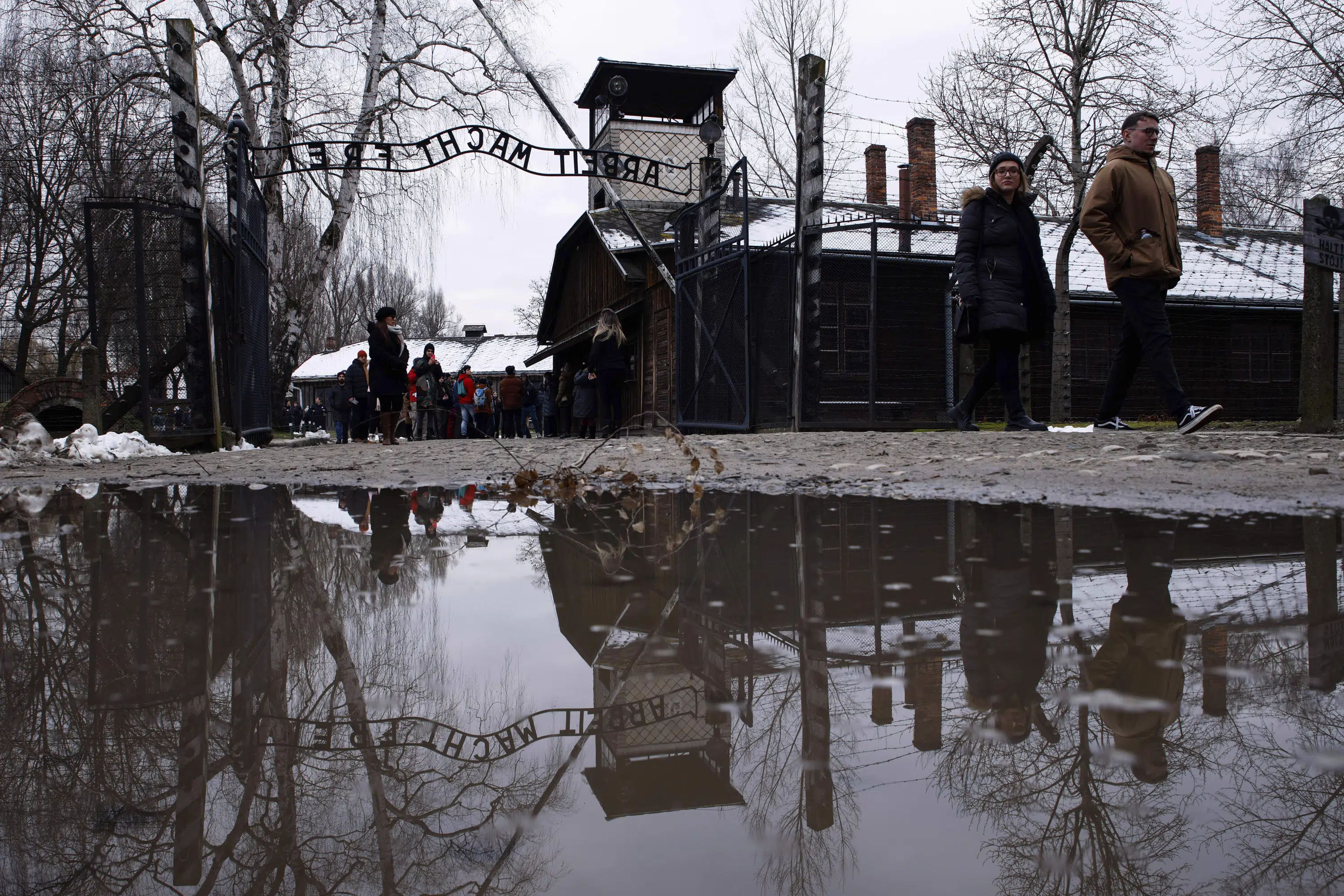 Auschwitz anniversary marked as peace again shattered by war