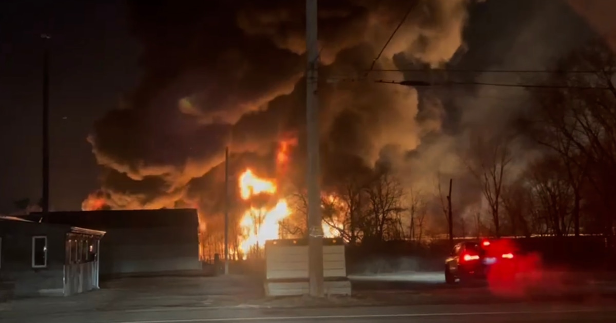 Ohio town under evacuation order after train derails, chemical burns